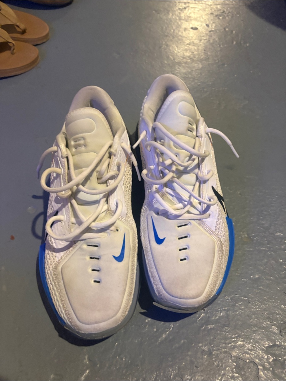 Nike Kids White Sneakers with Blue Accents